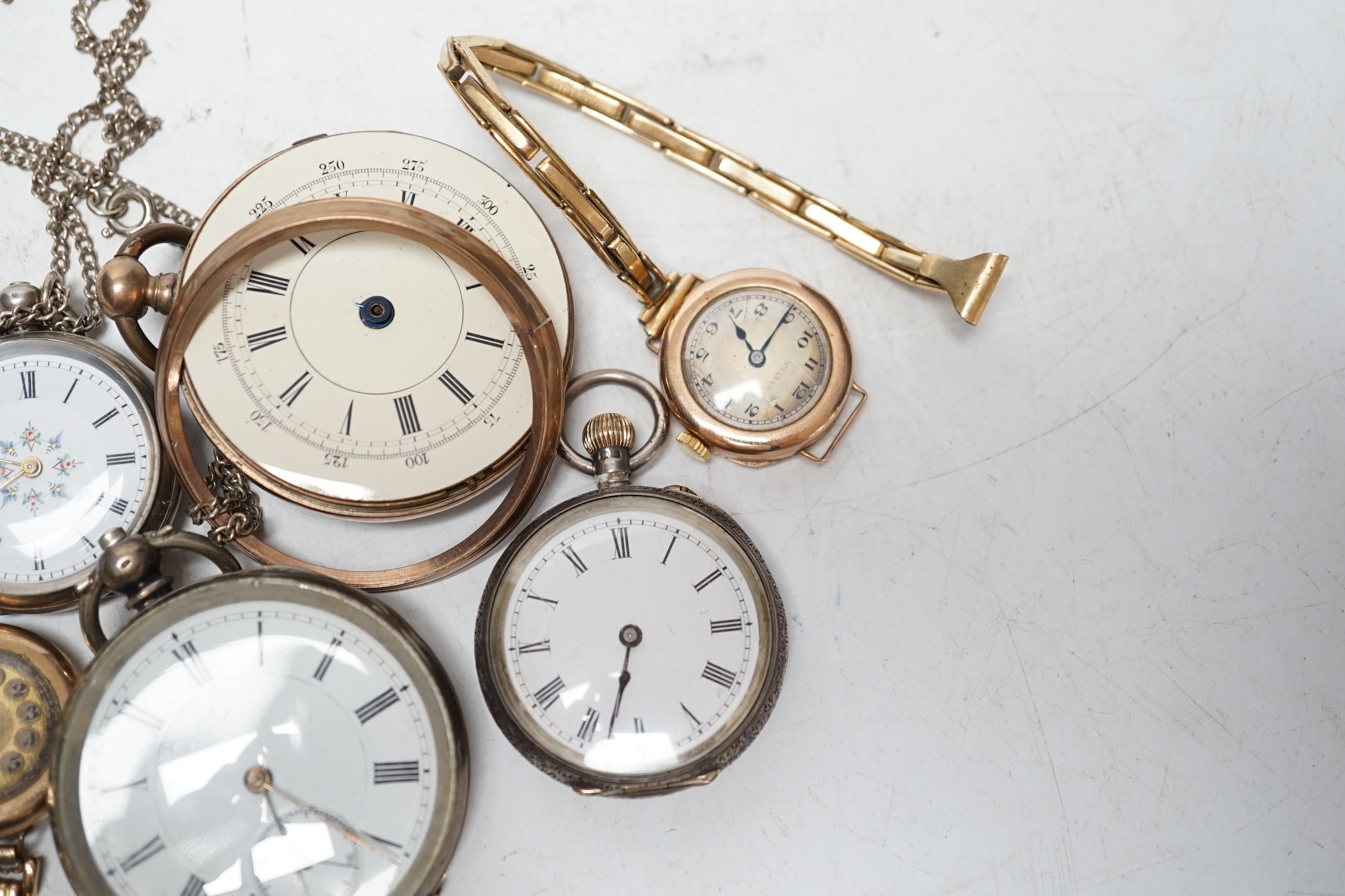 Two lady's 9ct gold manual wind wrist watches on gold plated straps, a gold plated wrist watch, two fob watches and two pocket watches. Condition - poor to fair